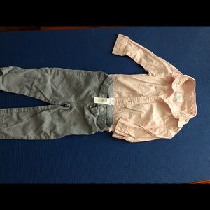 Pink dress shirt and blue pants